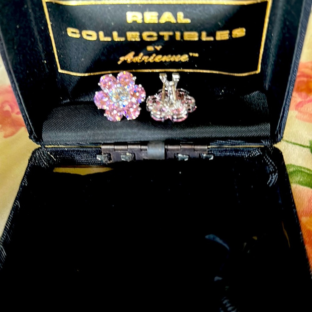 Gorgeous pink/cz crystal flower earrings. Pierced with clip on back.